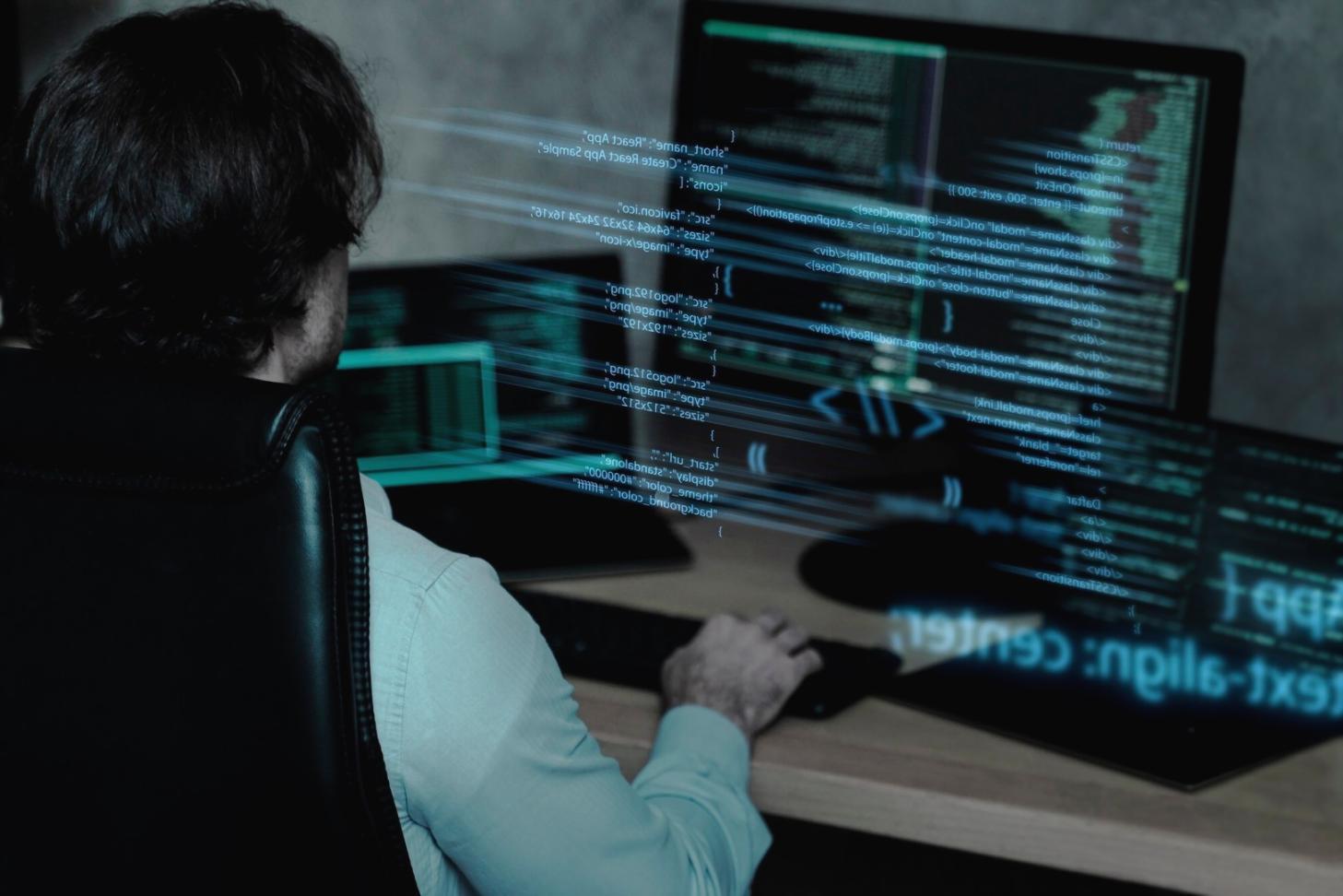 Students collaborating on VR development workstations